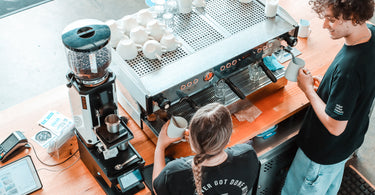 Barista Training - Learn how to Froth Milk on Both Sides of a coffee machine.